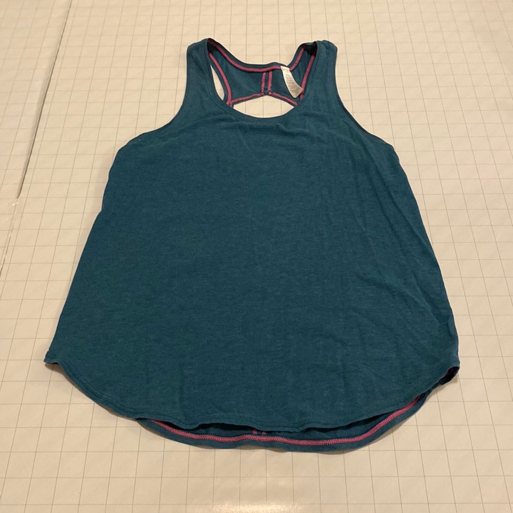Teal tank with pink hemming, fun cutout in the back